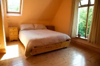 Rusheens Cottage. Charming comfortable cottage with sauna in peaceful valley.