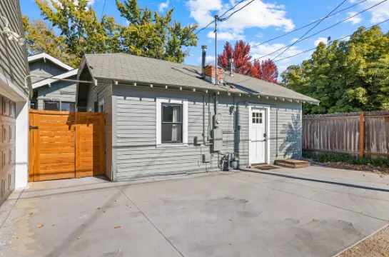 Cozy cottage in North End on tree-lined street.