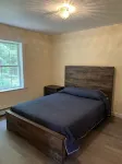 Tranquil cabin in the woods with heated garage.