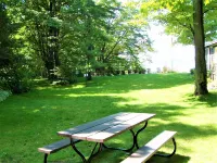 Fantastic Torch Lake Waterfront Cottage B ~ Tennis Court ~ Kayaks And SUP's!