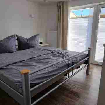 Charming apartment with sauna and large terrace, just a few steps from the beach. Rooms