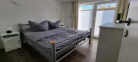 Charming apartment with sauna and large terrace, just a few steps from the beach.