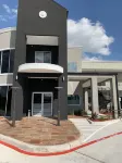 Scottish Inns and Suites Scarsdale Hotel dekat Space Center Houston