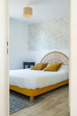 Appartement Cosy - Guer-Coëtquidan Отели рядом с достопримечательностью «La Maison du Graal»