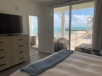 Extremely Rare Private White Sand Beach Front Unit on the Ocean