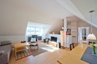 Cozy vacation apartment "Claire" directly at the harbor of Rheinsberg Hotels in Rheinsberg