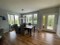 Waterfront condo with beach steps to Boyne City