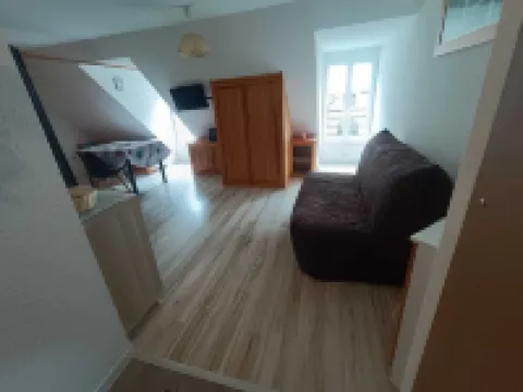 Classified studio apartment, in the center of town, facing the spa.