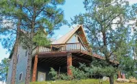 This is a luxurious two-story mountain retreat tucked in Ruidoso Downs, NM. Hotels in Ruidoso Downs