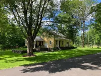 Charming 2-bedroom cottage on private 4 acres with modern amenities