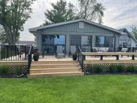 Memorable Vacation Awaits on Big Chapman Lake!  Sleeps 8!   Optional Pontoon! Hotels in Plain Township