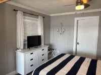 Experience Lake Life at Our 3-Bedroom Beachfront Cottage, Near Grand Rapids.