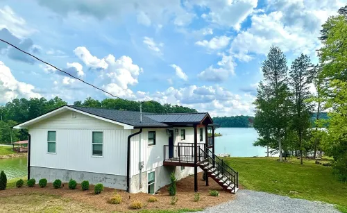 STAY HERE! 2 Homes sleep up to 28! Private cove 2 docks and personal boat launch