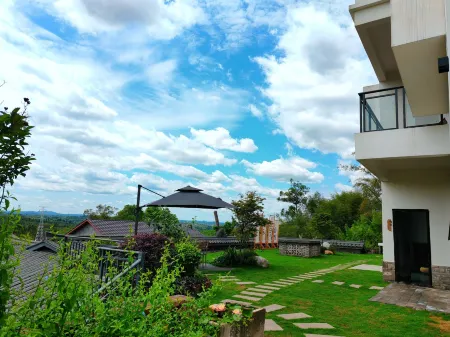 Lizhuang Half-Acre Blossom Field Homestay Отели рядом с достопримечательностью «Li Zhuang Lv You»