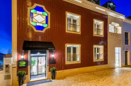 2M Boutique Hotel Отели рядом с достопримечательностью «Freeport Fashion Outlet»