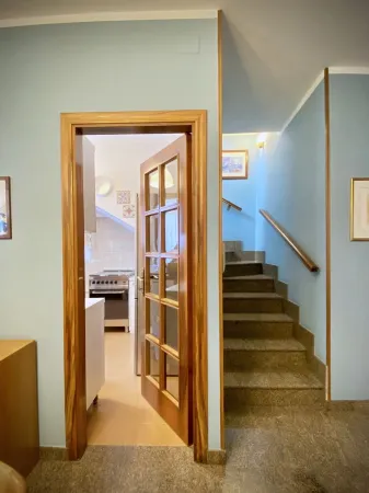 An exclusive terraced house in a very central position, 600 meters from the sea.