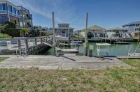 Steps to the Beach. Canal Front with New Dock. Clean, Cozy Getaway.