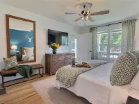 BRAND NEW! Walk to town! Hot tub, arcade pub, fire pit! Private, gated community
