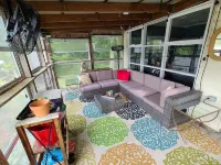 Private Riverfront Home with dock Hotels in Cople