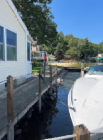 2 Bed/1 Bath Saunders Bay Gilford with boat slip. Walk to Meadowbrook for a show