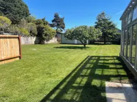 Newly remodeled 4 bedroom 3 bath house with giant fenced back yard and hot tub!