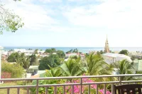 HIBISCUS AND ITS PANORAMIC SEA VIEW