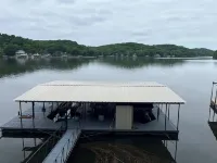 Lake house with three decks private dock and swim platform.