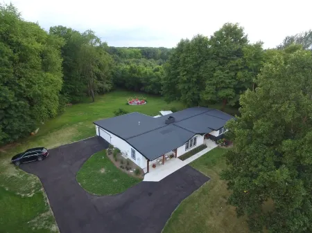 HOT TUB and SAUNA at 'CHIC HIDEAWAY''  Paw Paw Lake Golf club across the street