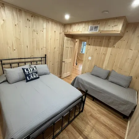 Lakefront 4 Bedroom 2 Bathroom Retreat with Beach and Dock
