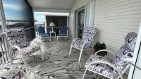 Quiet, clean & comfy 2 bed-2bath with 8000lb boat lift and large screened lanai