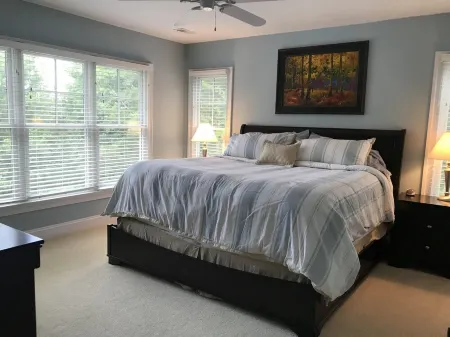 Large Lux Waterfront Home on 9 Acres with Sandy Beach and Beautiful Sunsets