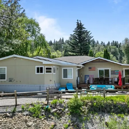 Private Cove River Home with water toys, 200 foot sandy beach and boat dock.