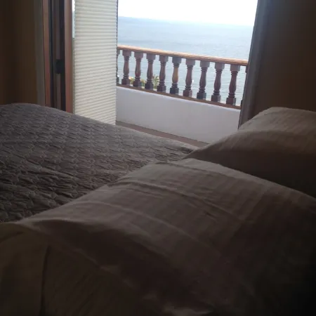 MAGNIFICENT OCEAN VIEW Hamilton Cove Condo With Golf Cart Included.