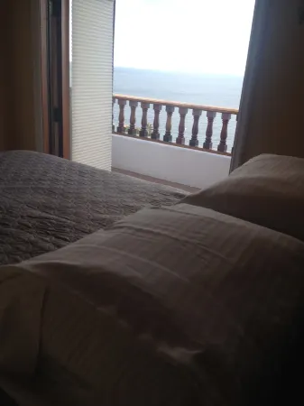 MAGNIFICENT OCEAN VIEW Hamilton Cove Condo With Golf Cart Included.