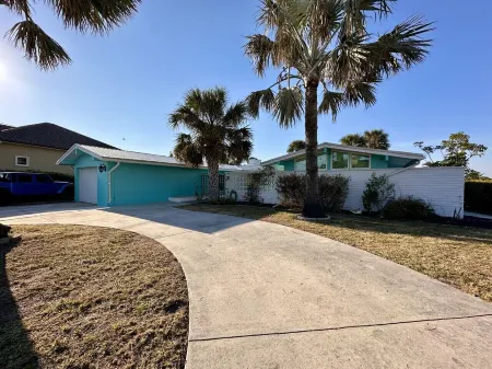 Remodeled Home on a Deep Canal with Amazing Water Views Just Blocks from Town