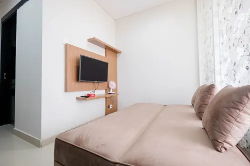 Warm and Homey 1Br Apartment at Atlanta Residences by Travelio Hotel di Kecamatan Beji