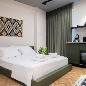 Muz Studios Hotels near TID Tower