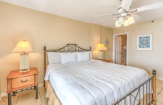 Beachfront condo with gulf/water views, central AC, balcony, W/D, & WiFi