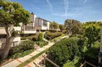 Expansive Oceanfront Patio and Resort-Style Amenities - Charming Coastal Haven