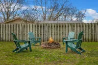 Charming Backyard Oasis with Fire Pit and Rec Room - Inviting Getaway