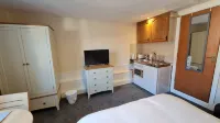 Grace Apartments - Living Rock
