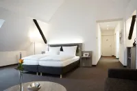 Hünerbein's Posthotel Hôtels à : Bad Essen