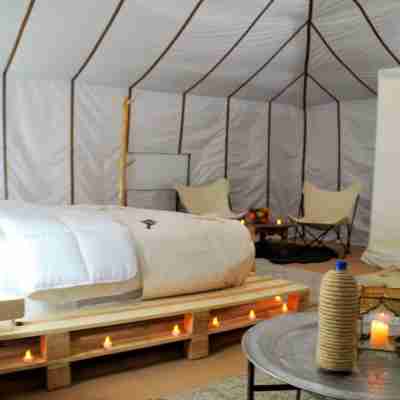 Tangerine Sky Camp Rooms