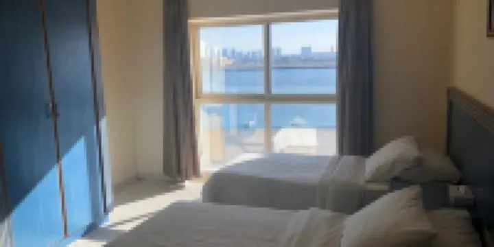 Julphar Hotel - Family Room,  Multiple Bedrooms