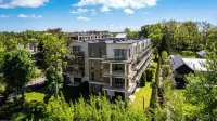 Apartamenty Sun & Snow Rozewie - Basen w Sezonie, Plac Zabaw, Sauna, Blisko plaży فنادق في Jastrzebia Gora
