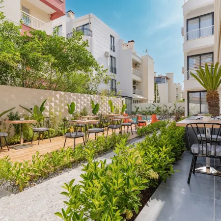 Echinus Lara Hotel Отели рядом с достопримечательностью «Antalya Expo Center»