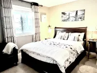 Legal Walkout suite with King-bed, Kitchen, Parking & Patio Hotels near Canadian Tire