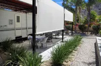 RV on private lot with pool 10 min walk to the beach