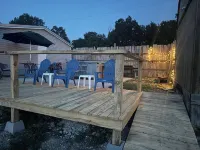 The Little Sugar Shack, a rustic tiny cabin with hot tub access & fiery sunsets!