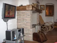Town house with a terrace and fire place in Scanno.
